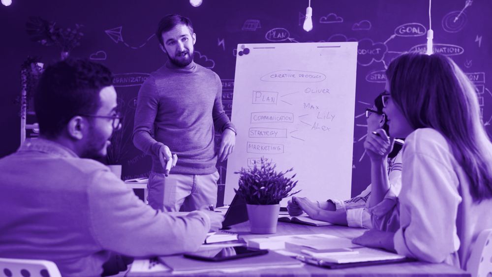 Team working at a whiteboard